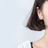Asymmetry Bee and Daisy flower cute silver stud earrings on modeling