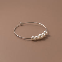 Pearl hoop earrings Silver close view