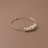 Pearl hoop earrings Silver close view