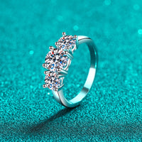 Three stones Moissanite engagement ring stand view