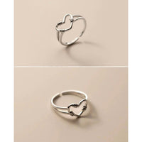 Two angles of adjustable silver rings, heart rings
